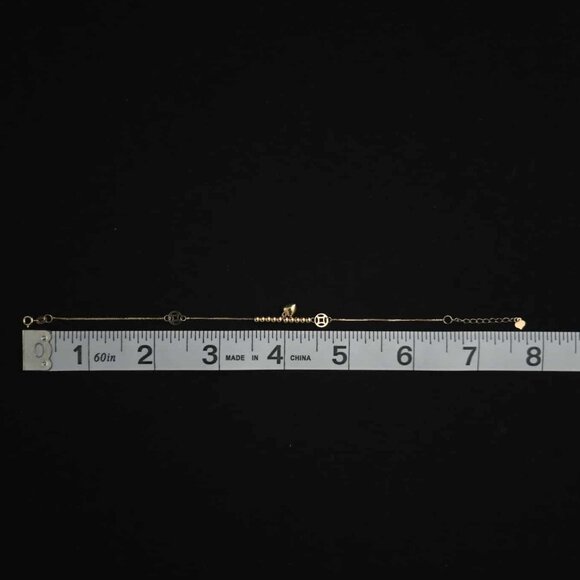 18k Bracelet with small balls and cute money catcher design as charm - Picture 7 of 16